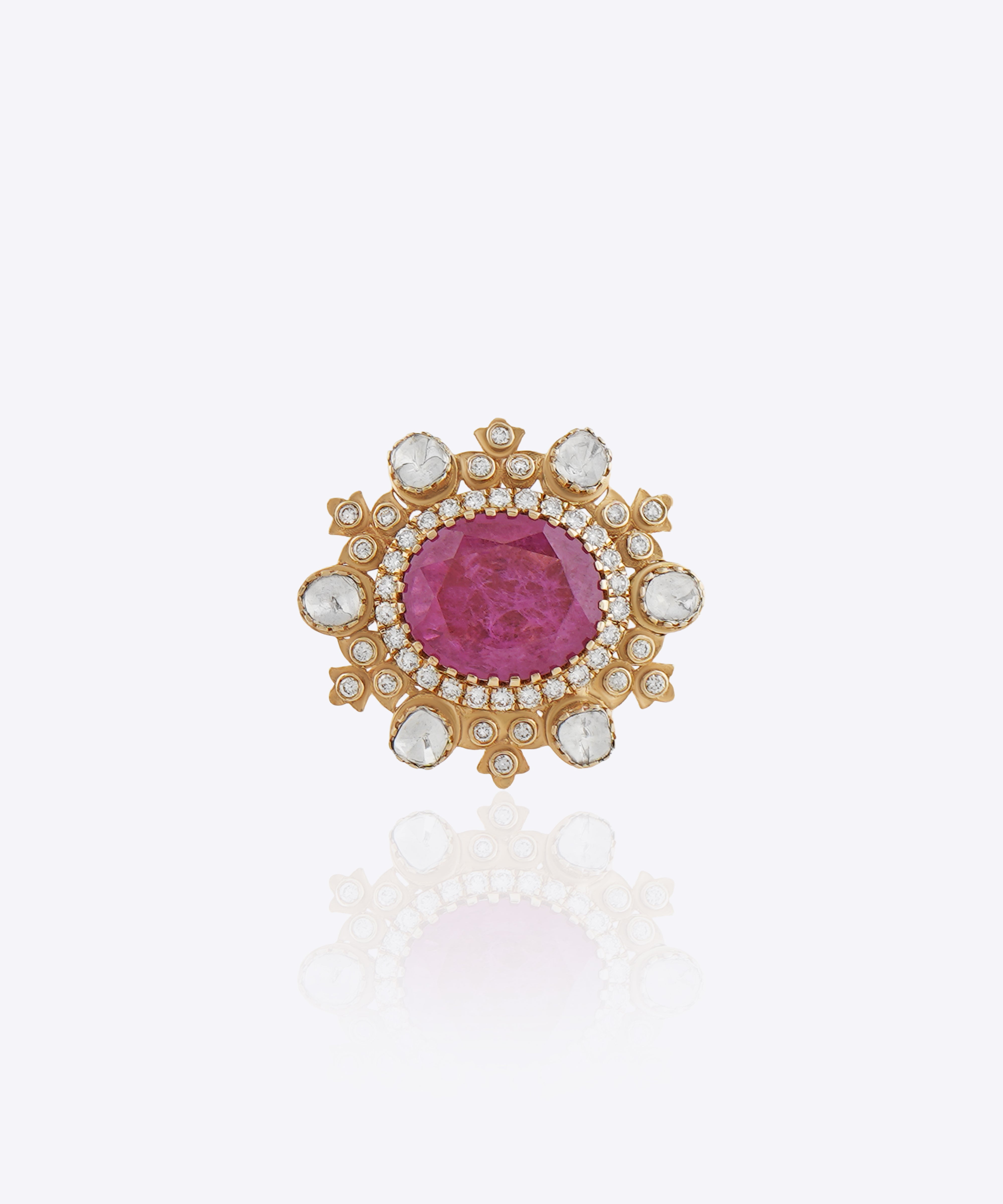 Blush Halo Ring featuring a large pink center stone encircled by a pearl halo with Polki detailing.
