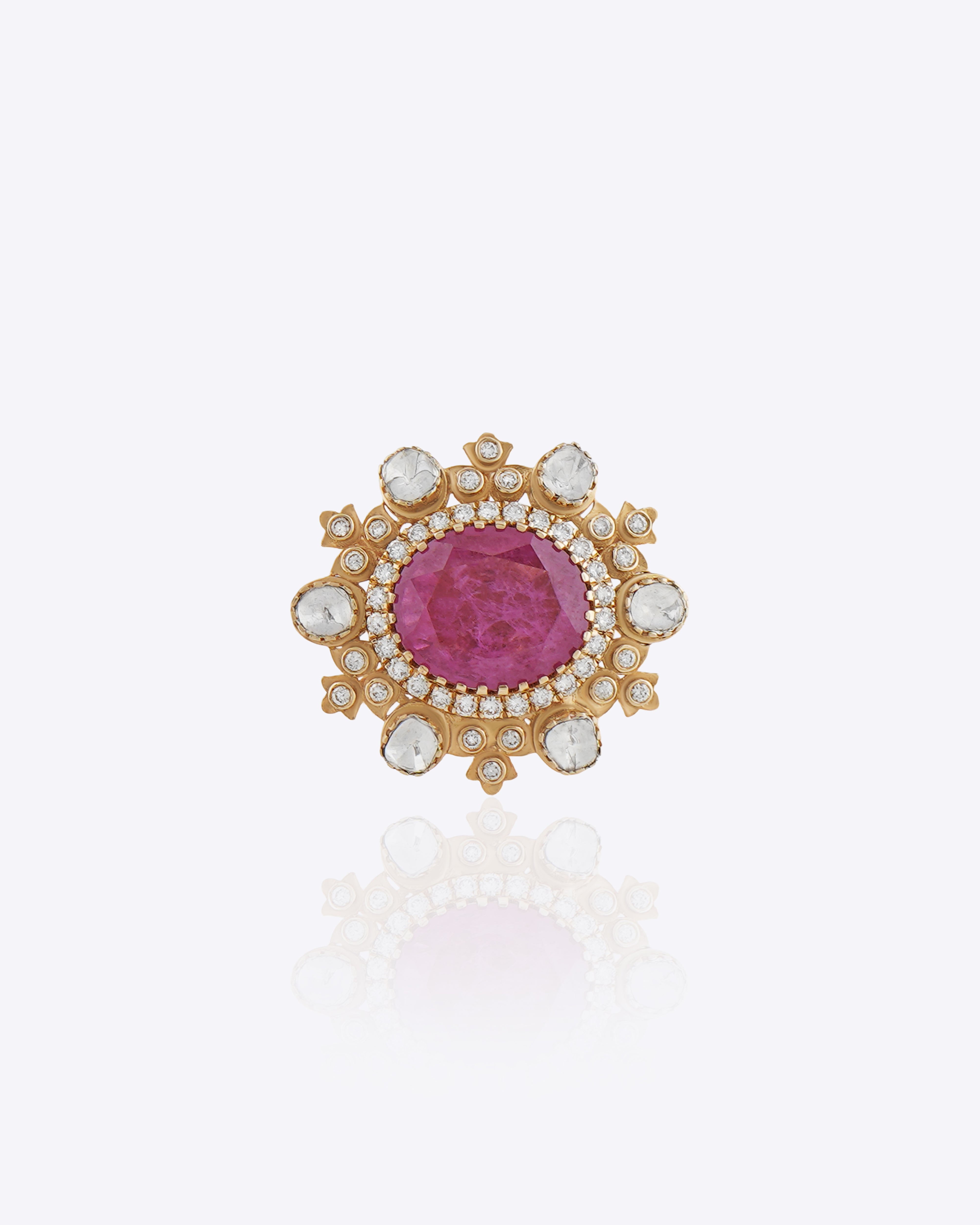 Blush Halo Ring featuring a large pink center stone encircled by a pearl halo with Polki detailing.
