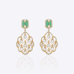 Featuring emerald-cut stones, carved gold filigree, and Polki detailing.