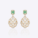 Featuring emerald-cut stones, carved gold filigree, and Polki detailing.