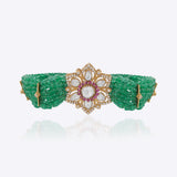 Daisy Radiance Polki gold bracelet with a delicate gemstone centre and elegant floral motif.