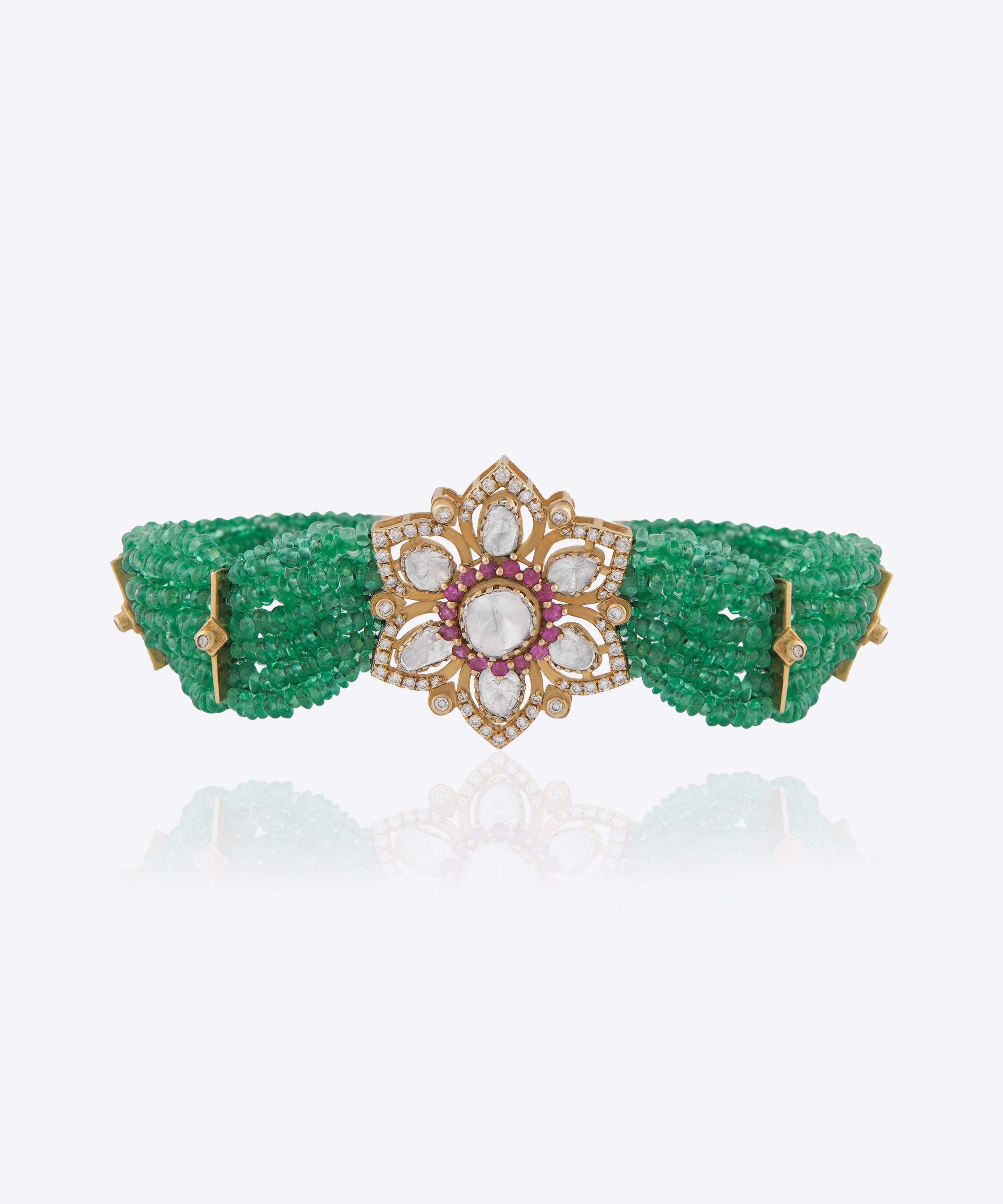 Daisy Radiance Polki gold bracelet with a delicate gemstone centre and elegant floral motif.