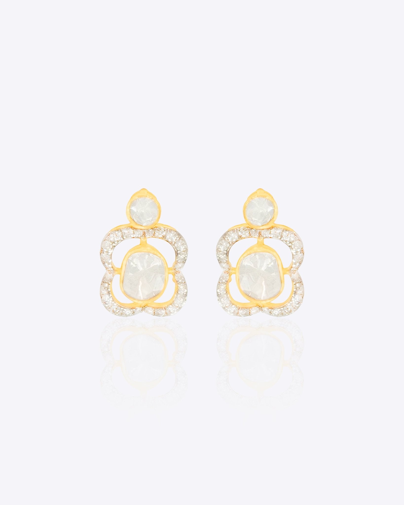 Floral Polki diamond tiara-inspired earrings in 14K gold with regal sparkle.