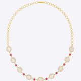 Starlight Rose Necklace in 18K gold with faceted stones and a ruby accent