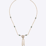 9K gold Opaline Muse necklace with a Polki medallion and emerald-toned accents.