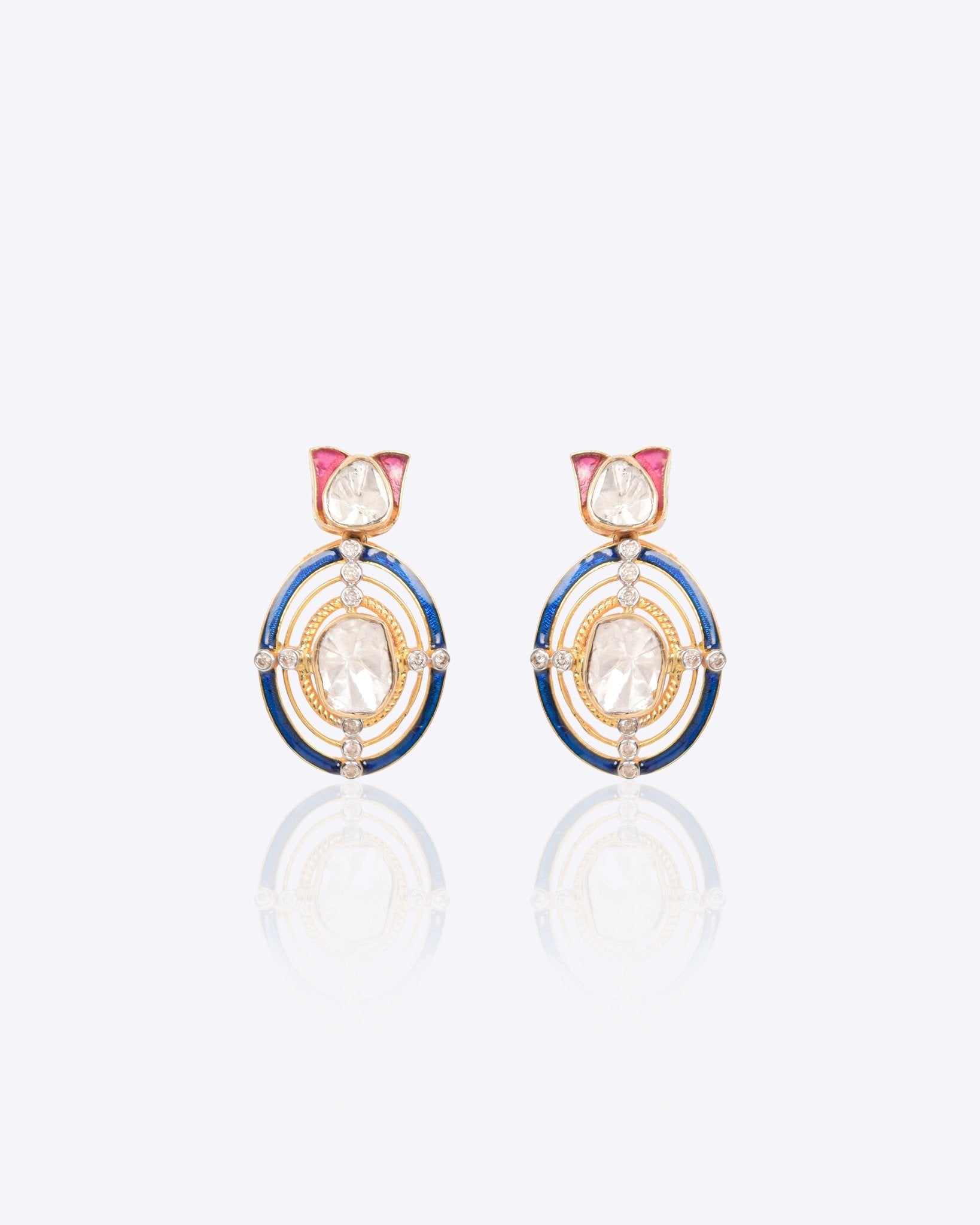 Radiant Polki diamond earrings in 18K gold with talaf stone framing.