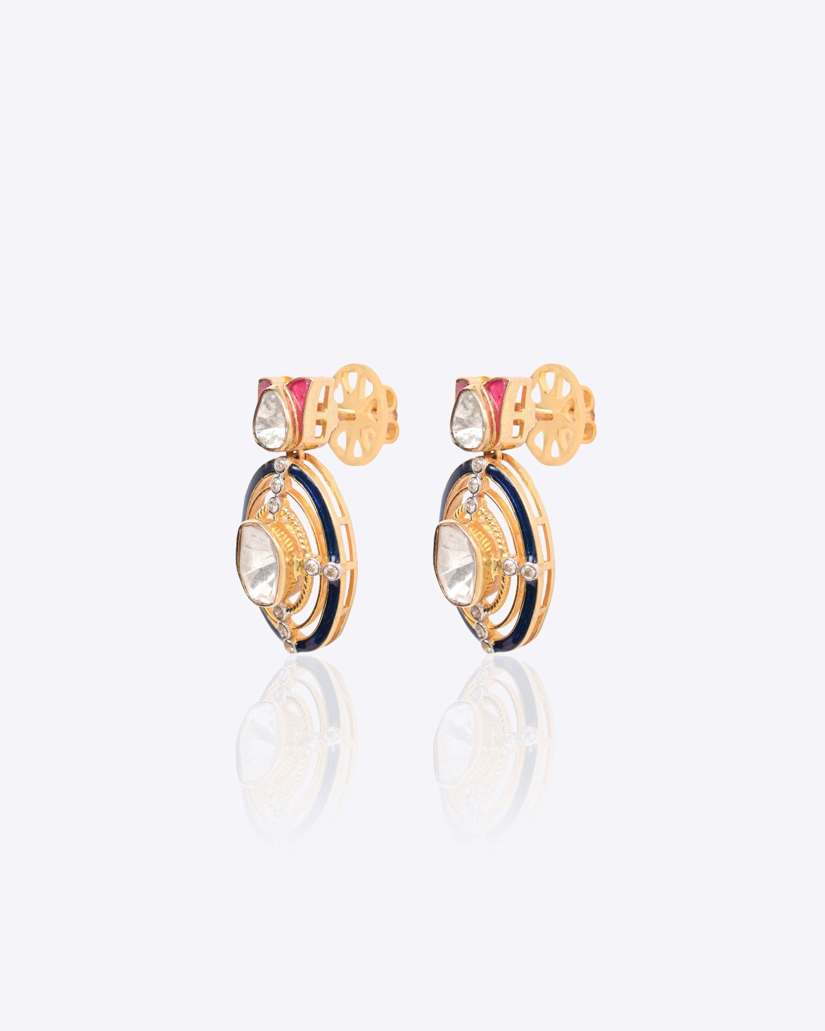 Radiant Polki diamond earrings in 18K gold with talaf stone framing.