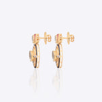 Radiant Polki diamond earrings in 18K gold with talaf stone framing.