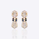 18K gold hexagonal earrings with Polki and vibrant talaf stone accents.