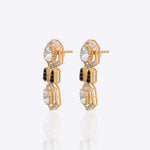 18K gold hexagonal earrings with Polki and vibrant talaf stone accents.