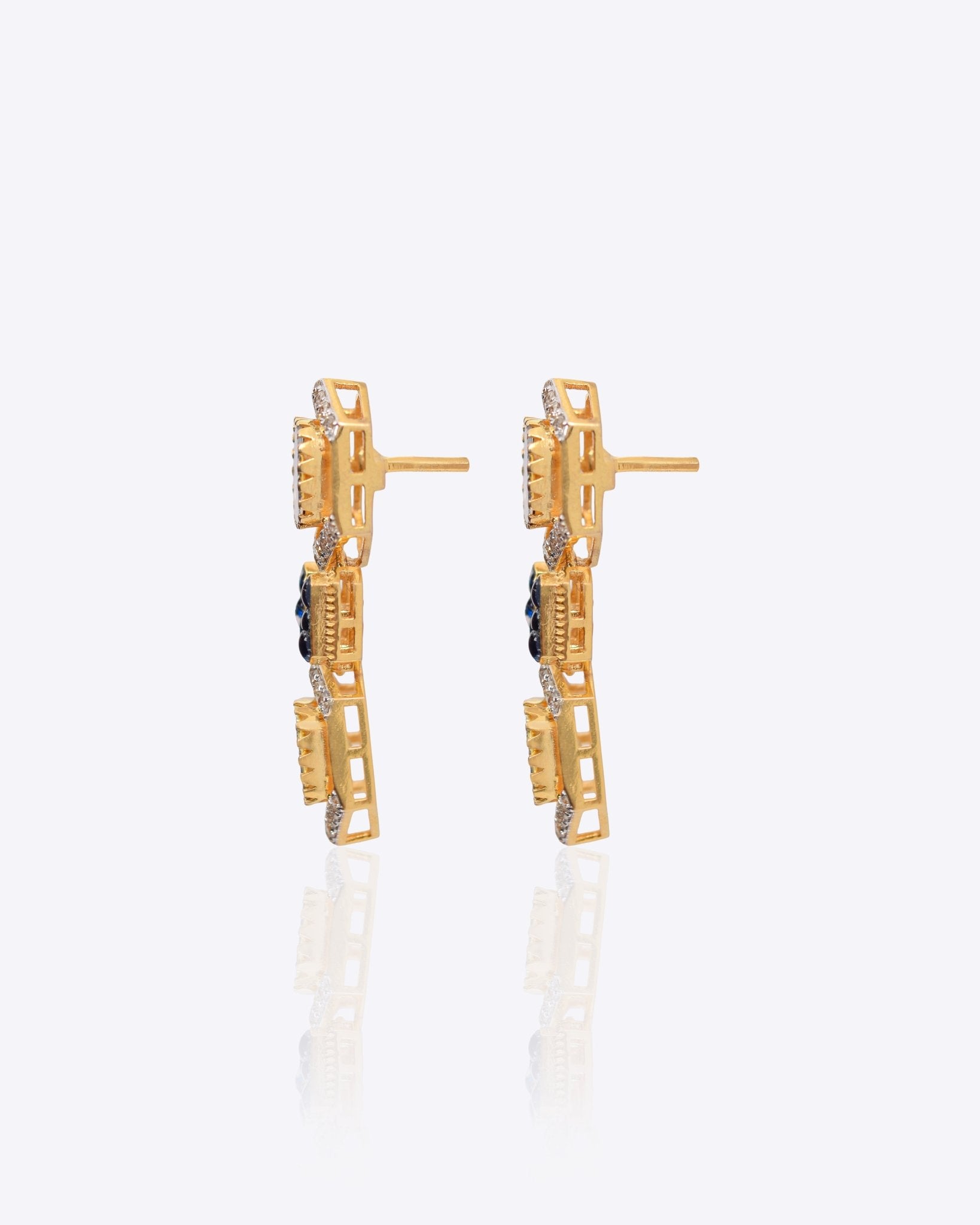 18K gold hexagonal earrings with Polki and vibrant talaf stone accents.