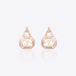 14k gold geometric earrings with delicate Polki diamonds