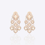 Sundown Flora Earrings in 18K gold with central Polki encircled by diamonds.
