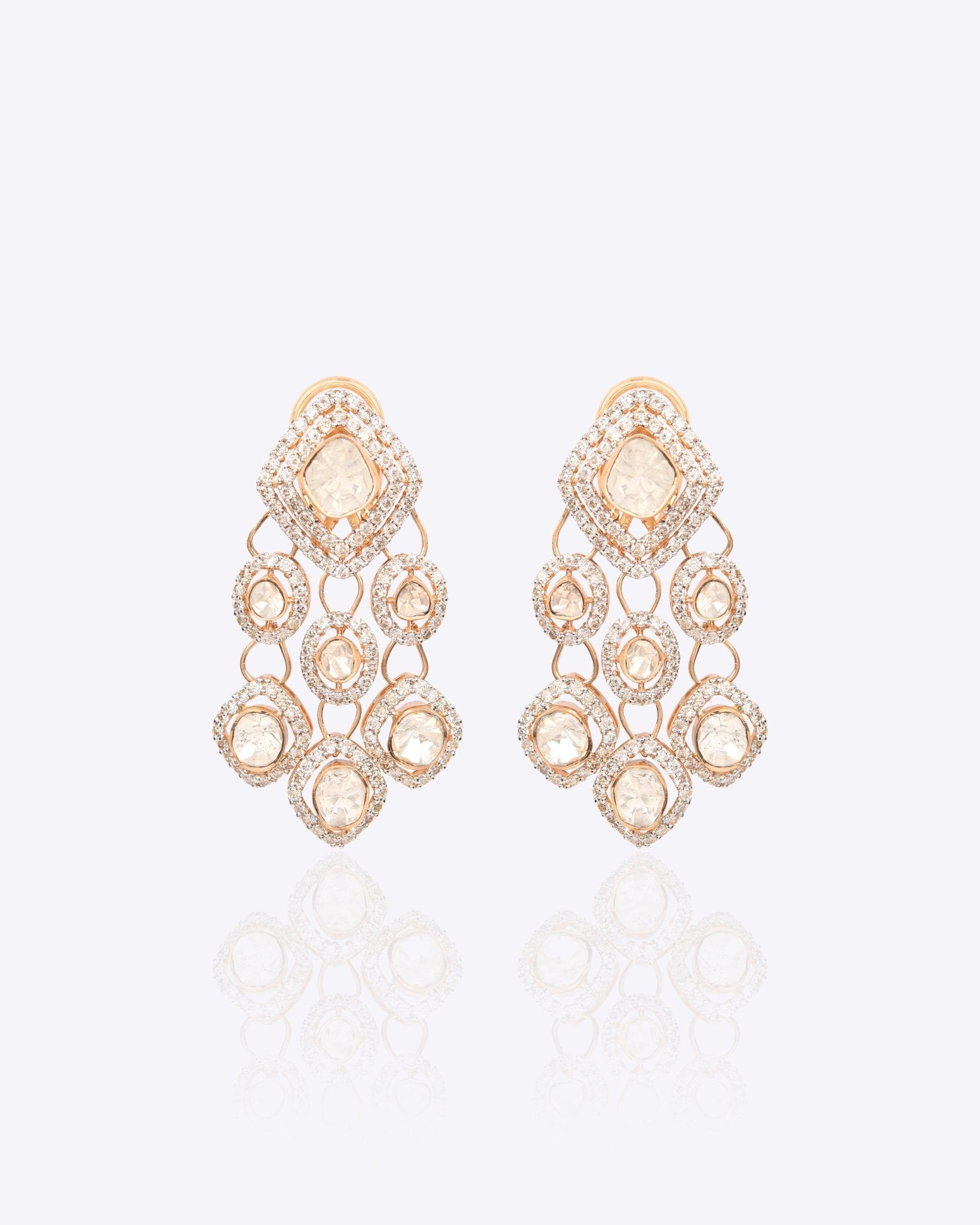 Sundown Flora Earrings in 18K gold with central Polki encircled by diamonds.