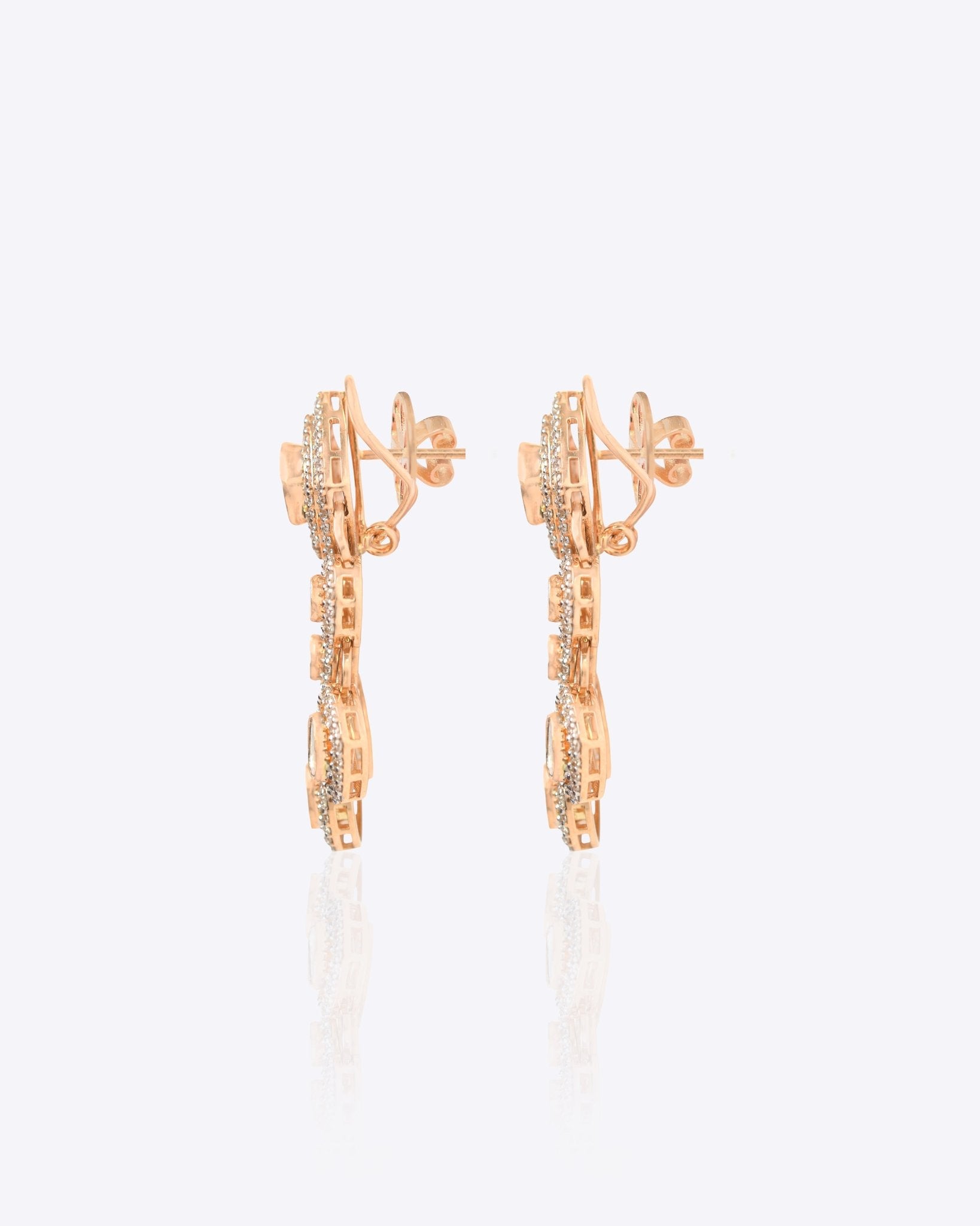 Sundown Flora Earrings in 18K gold with central Polki encircled by diamonds.