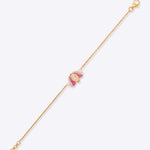 14K gold bracelet with a minimalist lotus motif and Polki diamond detailing.