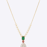 14K gold necklace with teardrop Polki, ruby, and green stone accents.