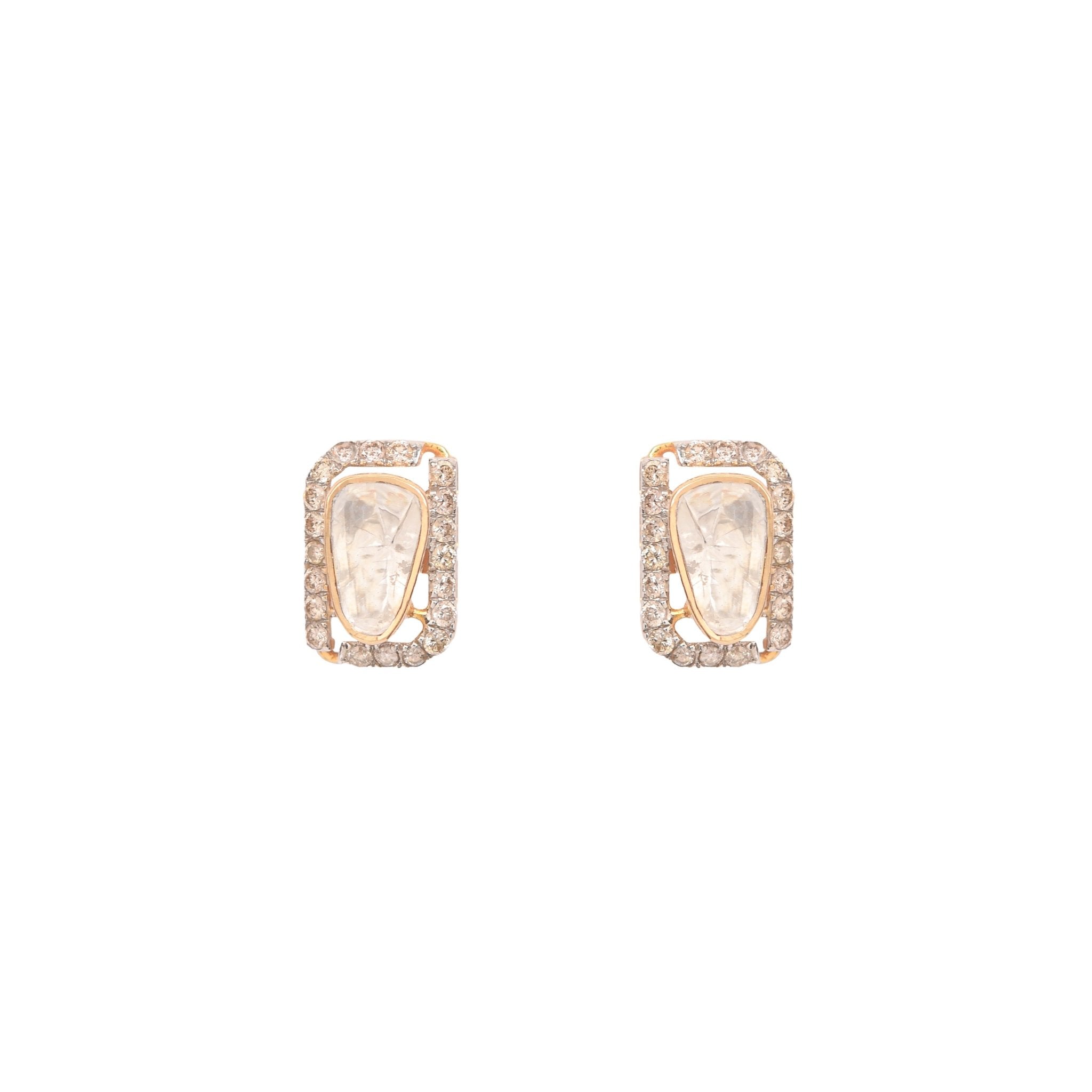 Squarelet earrings styled with power suit, giving geometric elegance with diamond-polki center.
