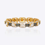 14K gold wristlet with blue talaf stones and sparkling Polki diamonds.