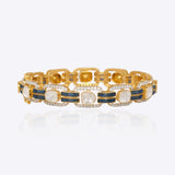 14K gold wristlet with blue talaf stones and sparkling Polki diamonds.