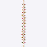 Bracelet with faceted gemstones in green, pink, purple, and white