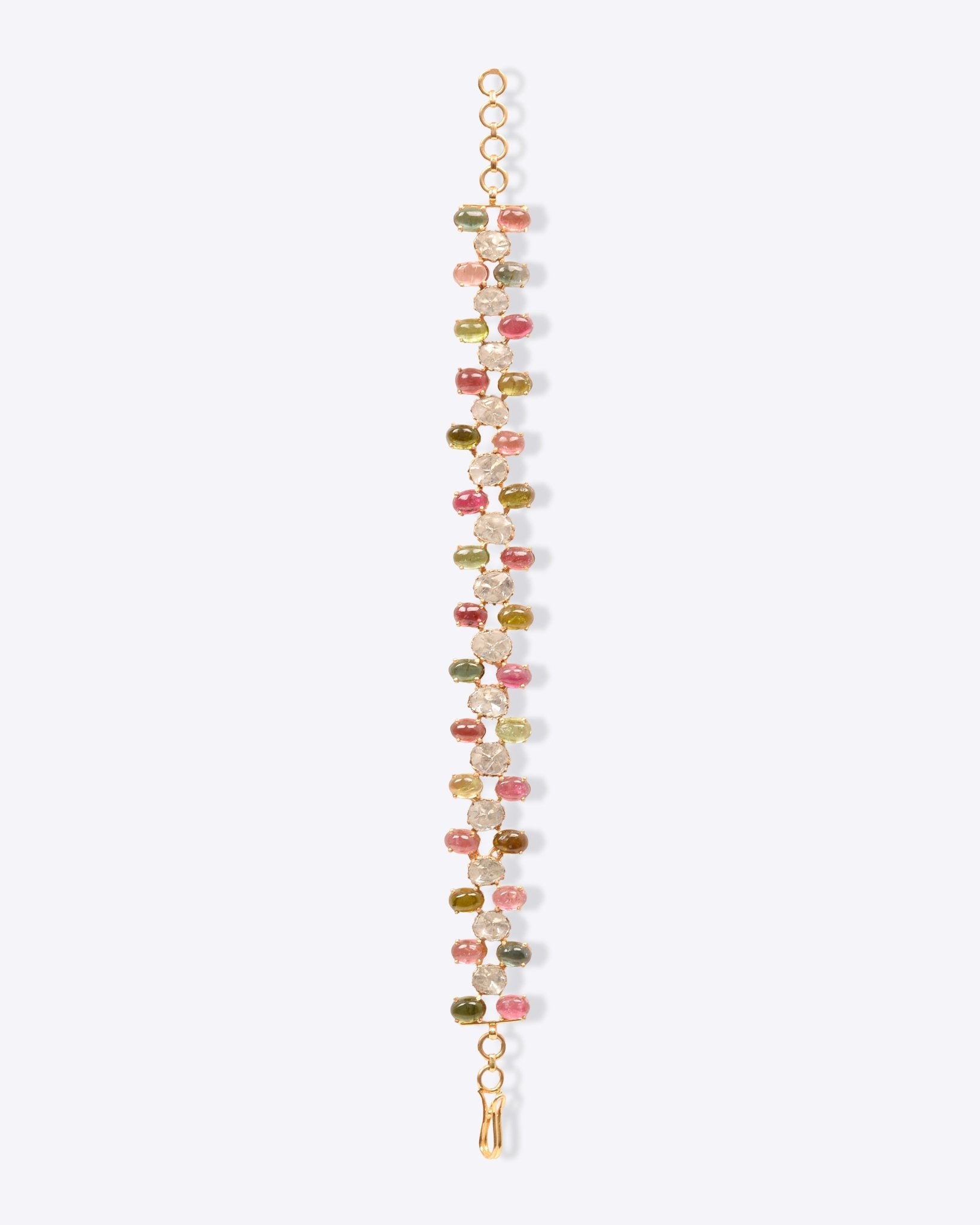 Bracelet with faceted gemstones in green, pink, purple, and white