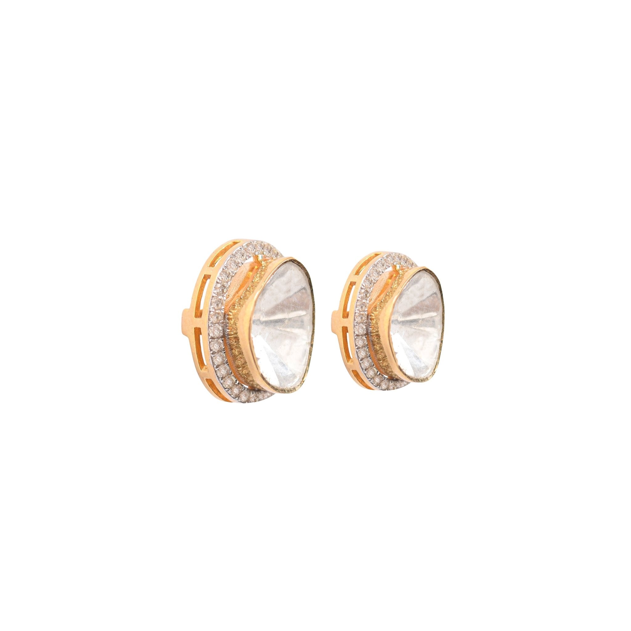 Iconic round polki studs styled on model, highlighting polished diamond gleam.