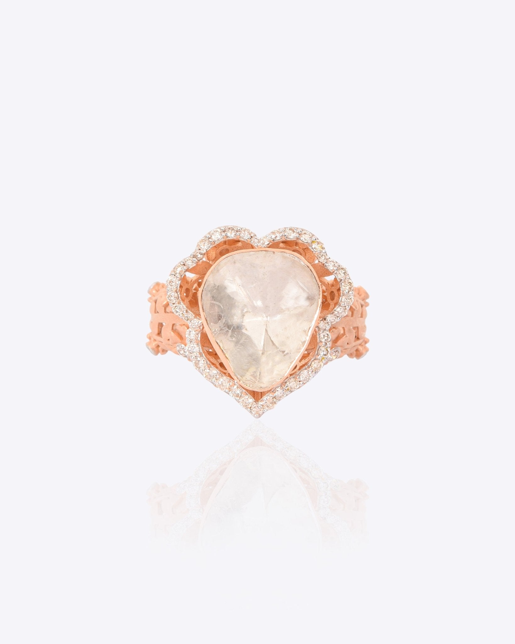 14k gold Pinksoul Polki Ring with a luminous Polki diamond and brilliant-cut stones.