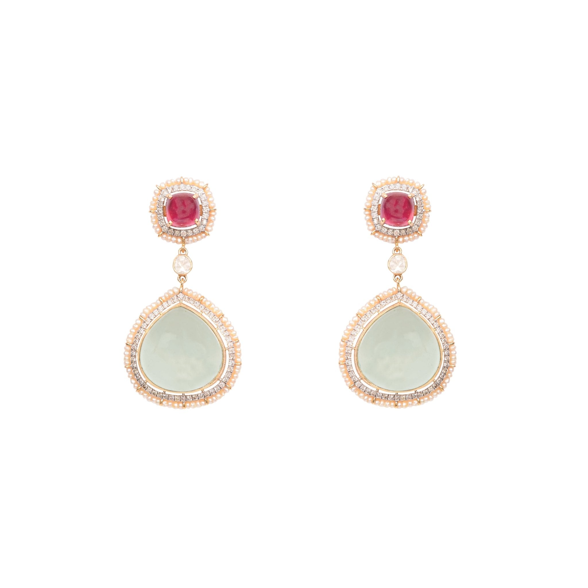 Jewellery image of a ruby and fluorite blend design with heart-inspired gold and Polki elements.