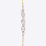 Whimsicle Diamond Polki Bracelet in 14k gold with floral motifs and oval Polki diamonds.