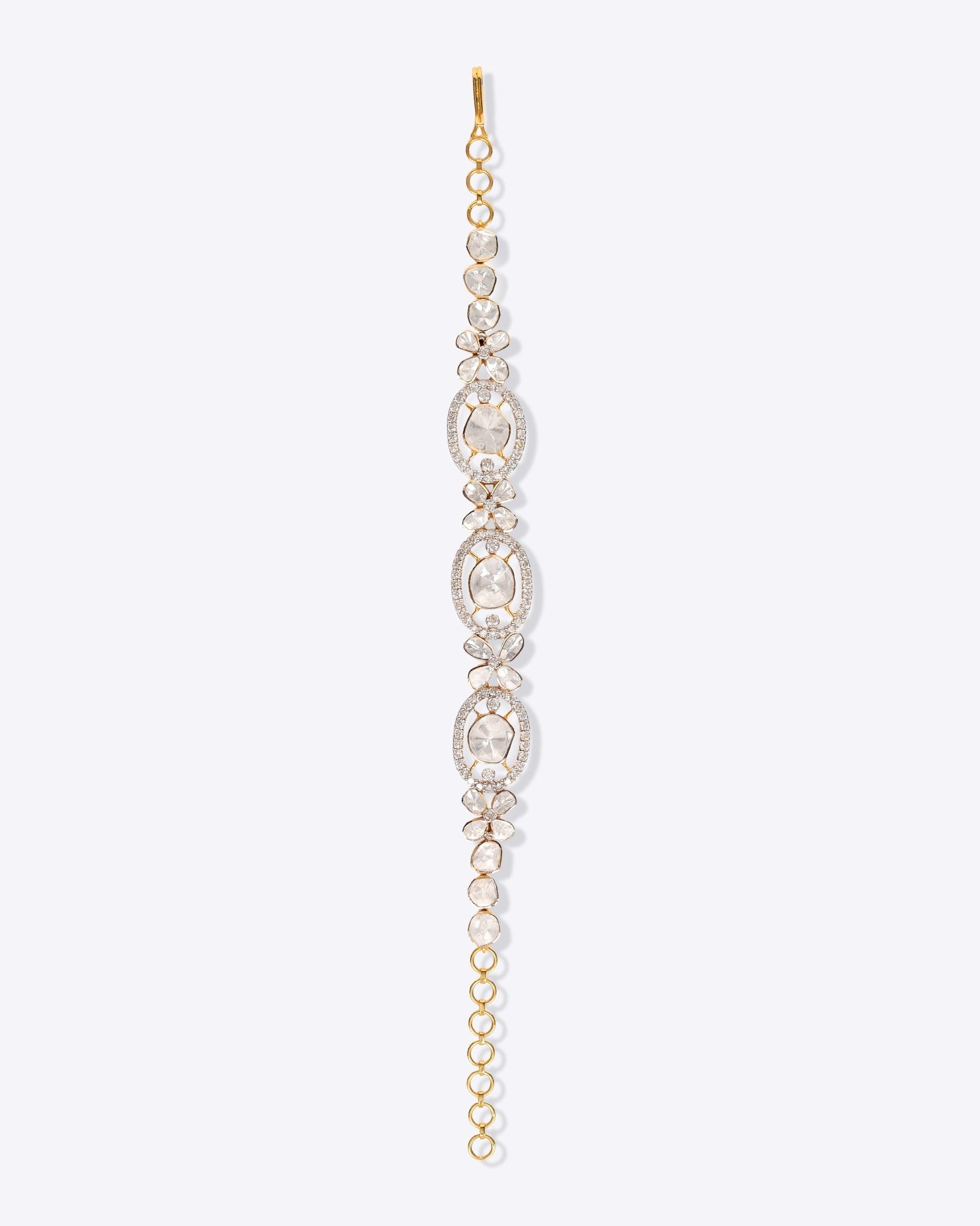 Whimsicle Diamond Polki Bracelet in 14k gold with floral motifs and oval Polki diamonds.