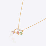 Spring in Bloom Pendant in 14k gold with upside-down tulip motifs