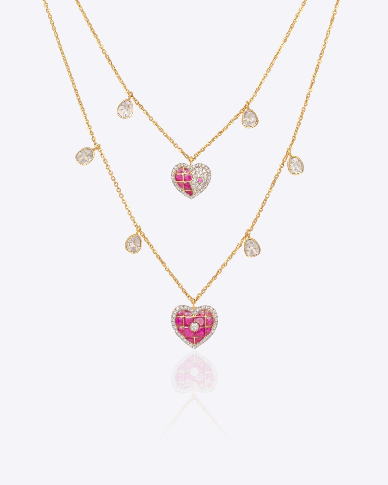 Sweetheart Necklace in 14k gold with a pink heart pendant on a double chain.