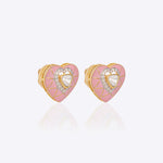 18K gold heart-shaped stud earrings with pink tones and Polki center