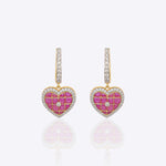 Sweetheart Earrings in 14k gold with heart-shaped drops and brilliant-cut diamonds.