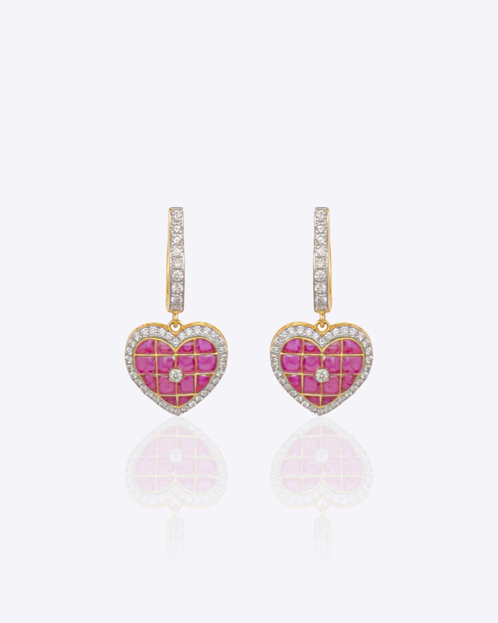 Sweetheart Earrings in 14k gold with heart-shaped drops and brilliant-cut diamonds.