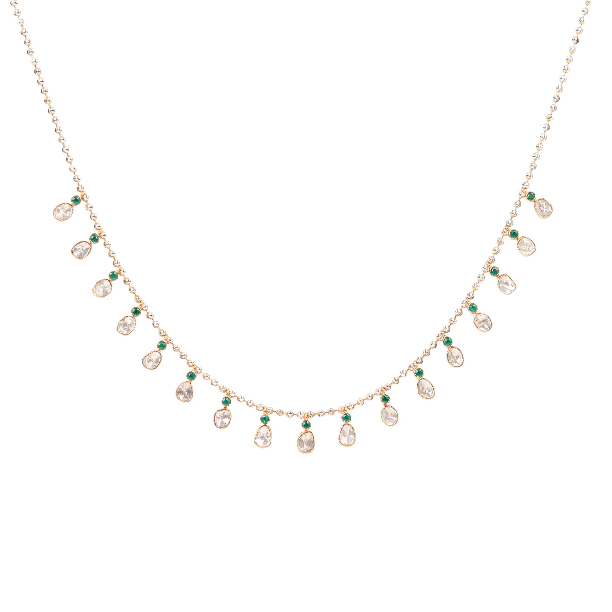 Clementine necklace worn on model with bright and bold jewel tones