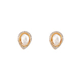 Vivacity Polki Diamond Earrings. Crafted with exquisite 18k gold, each set boasts two resplendent polki diamonds embraced by a halo of dazzling diamonds. 