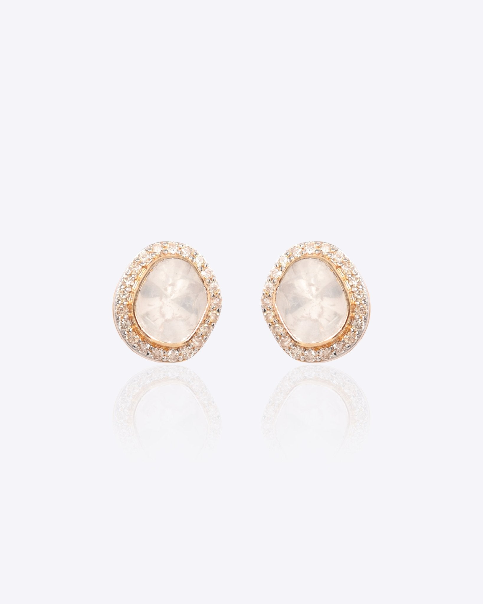 14k gold stud earrings with two Polki stones and diamonds
