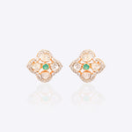18K gold rhombus earrings with a Polki center and diamonds