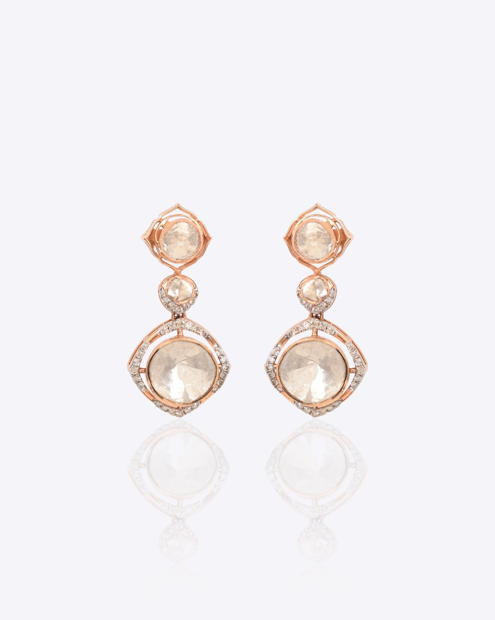 18k gold Noori earrings with Polki diamonds in a constellation-inspired design.