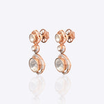 18k gold Noori earrings with Polki diamonds in a constellation-inspired design.