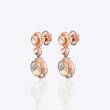 18k gold Noori earrings with Polki diamonds in a constellation-inspired design.