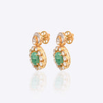 14k gold earrings with emerald studs, diamonds, and Polki drop