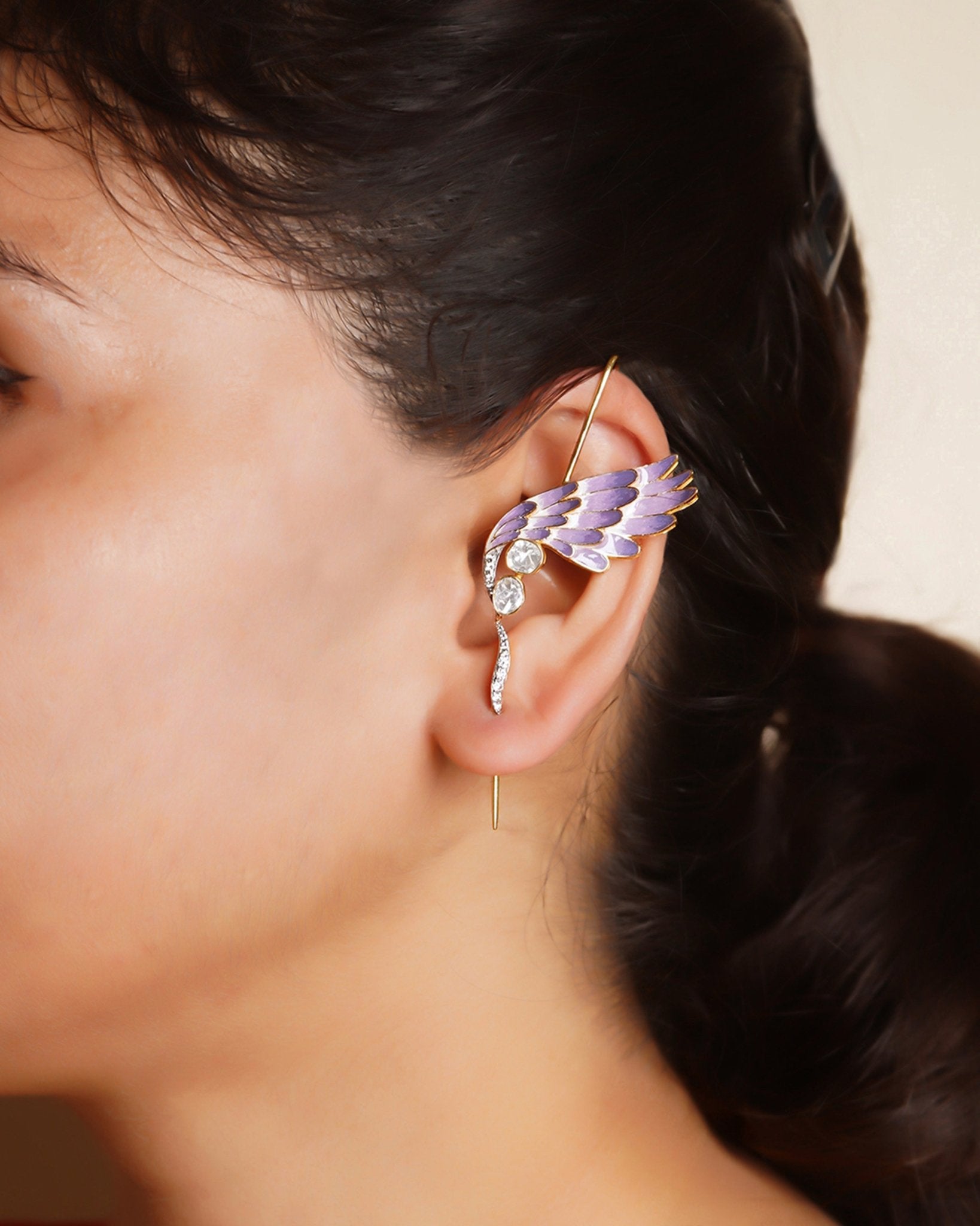 14k gold asymmetrical Polki earring set with a stud and earcuff