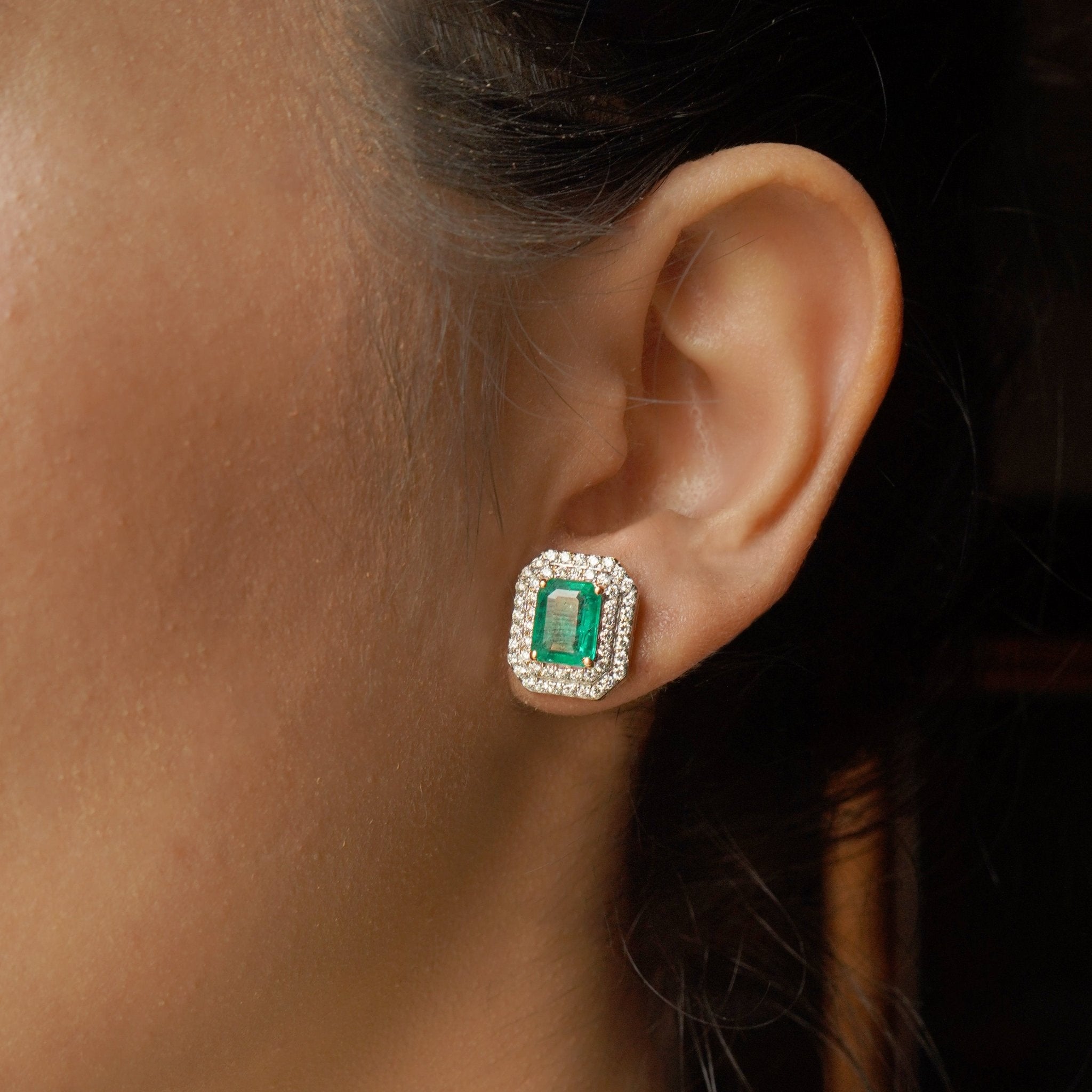 Emerald Essence Studs styled with gown, featuring twin halo emerald-polki configuration.