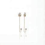 14K gold Cirelle Chain Drop earrings with elegant Polki detailing and delicate moving chains.