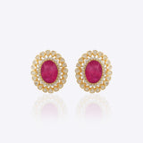 14k gold stud earrings with ruby center and uncut diamond halo