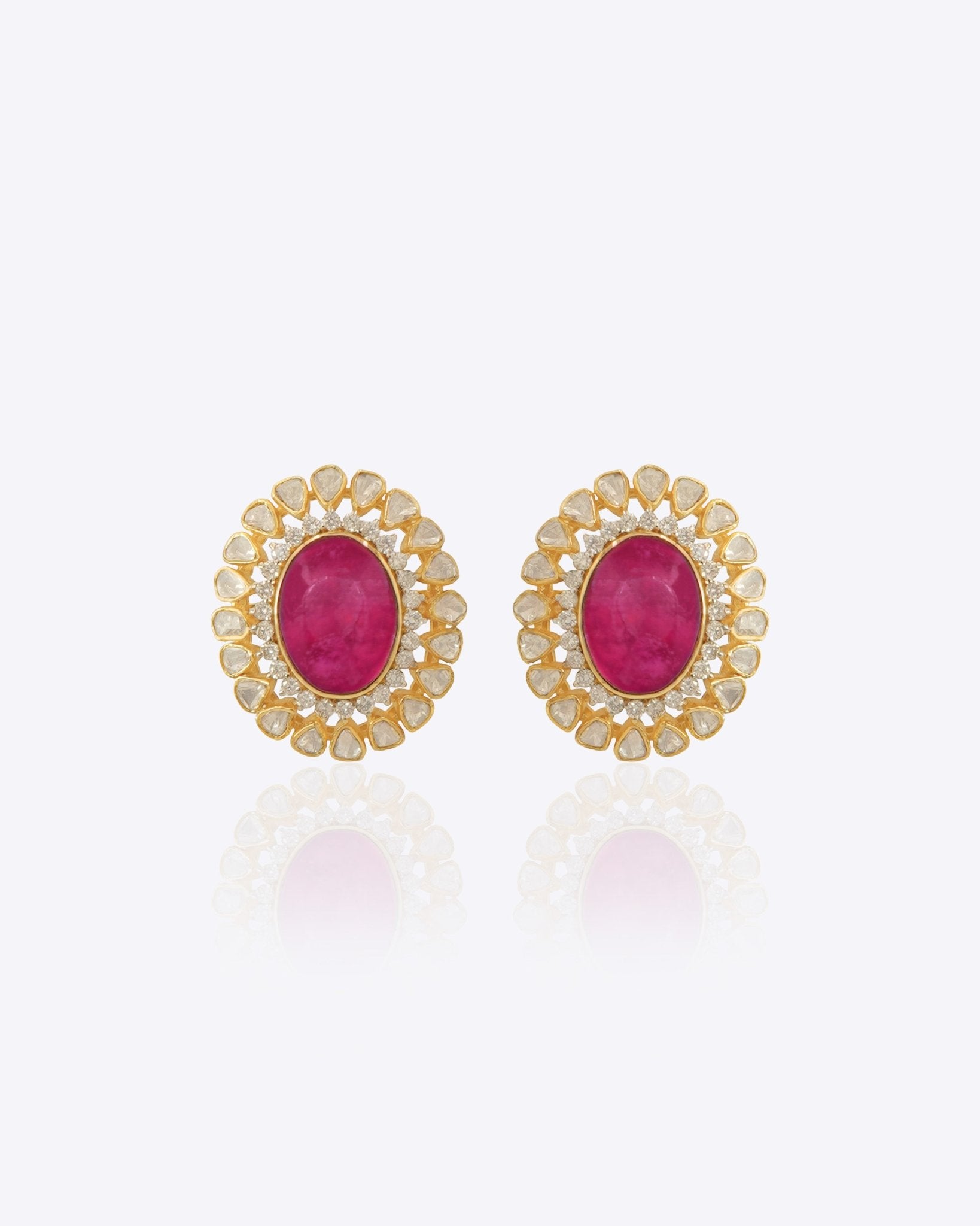 14k gold stud earrings with ruby center and uncut diamond halo