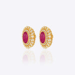 14k gold stud earrings with ruby center and uncut diamond halo